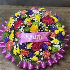 VIBRANT MOTHERS DAY CEMETERY POSY 
